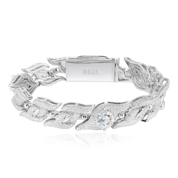 Silver ring with intricate design and visible brand on a white background