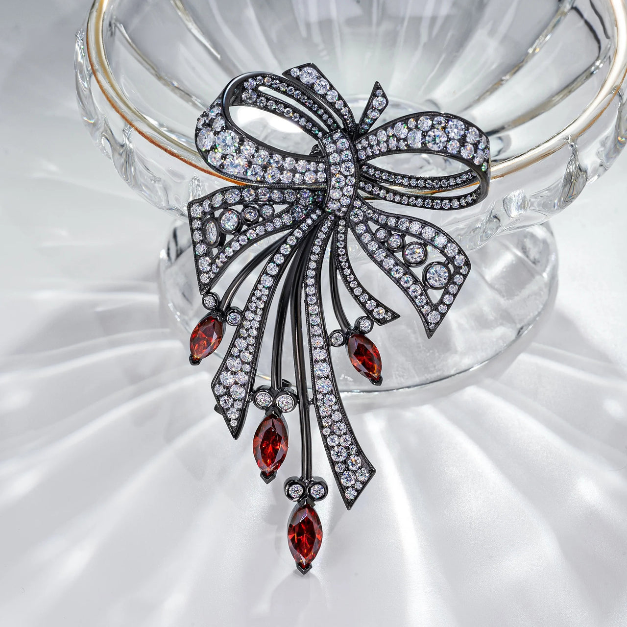 18K WHITE GOLD PLATED MOISSANITE CRIMSON ELEGANCE BOW BROOCH IN STERLING SILVER