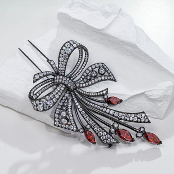 18K WHITE GOLD PLATED MOISSANITE CRIMSON ELEGANCE BOW BROOCH IN STERLING SILVER