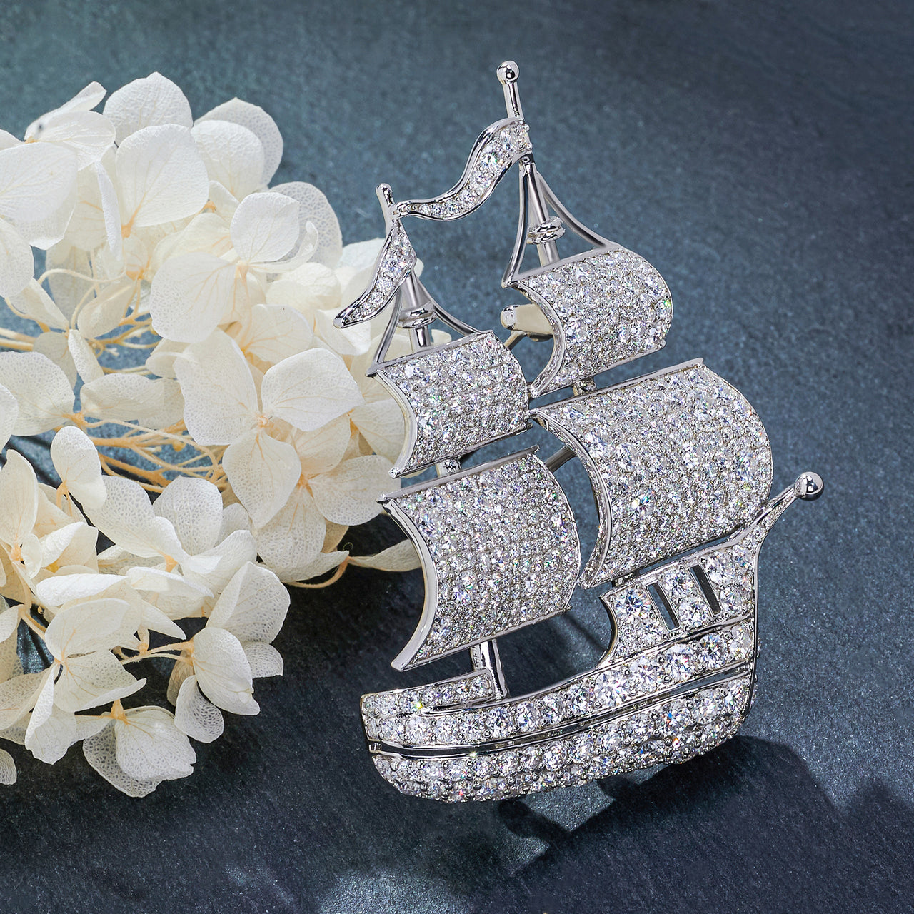 18K WHITE GOLD PLATED SAILING SERENITY BROOCH IN STERLING SILVER