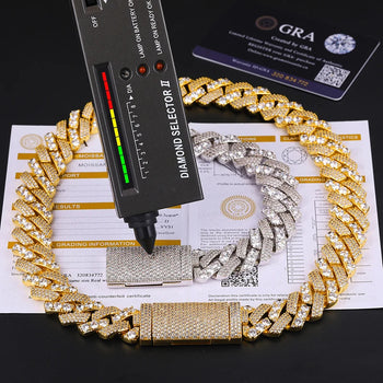 Gold and silver diamond-encrusted chain on a document with a diamond selector tool.