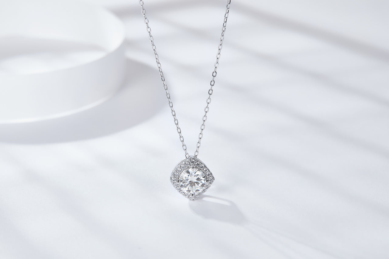 1CT ENCASED ROUND CUT MOISSANITE PENDANT NECKLACE IN STERLING SILVER