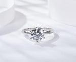 IE00199 1CT ROUND CUT MOISSANITE RING IN STERLING SILVER