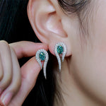 2.8CT MAOISSANITE EMERALD TIDE EARRINGS IN STERLING SILVER