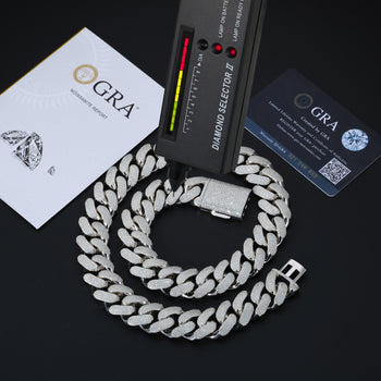 Silver chain necklace with diamond selector tool and GRA certification on a black background