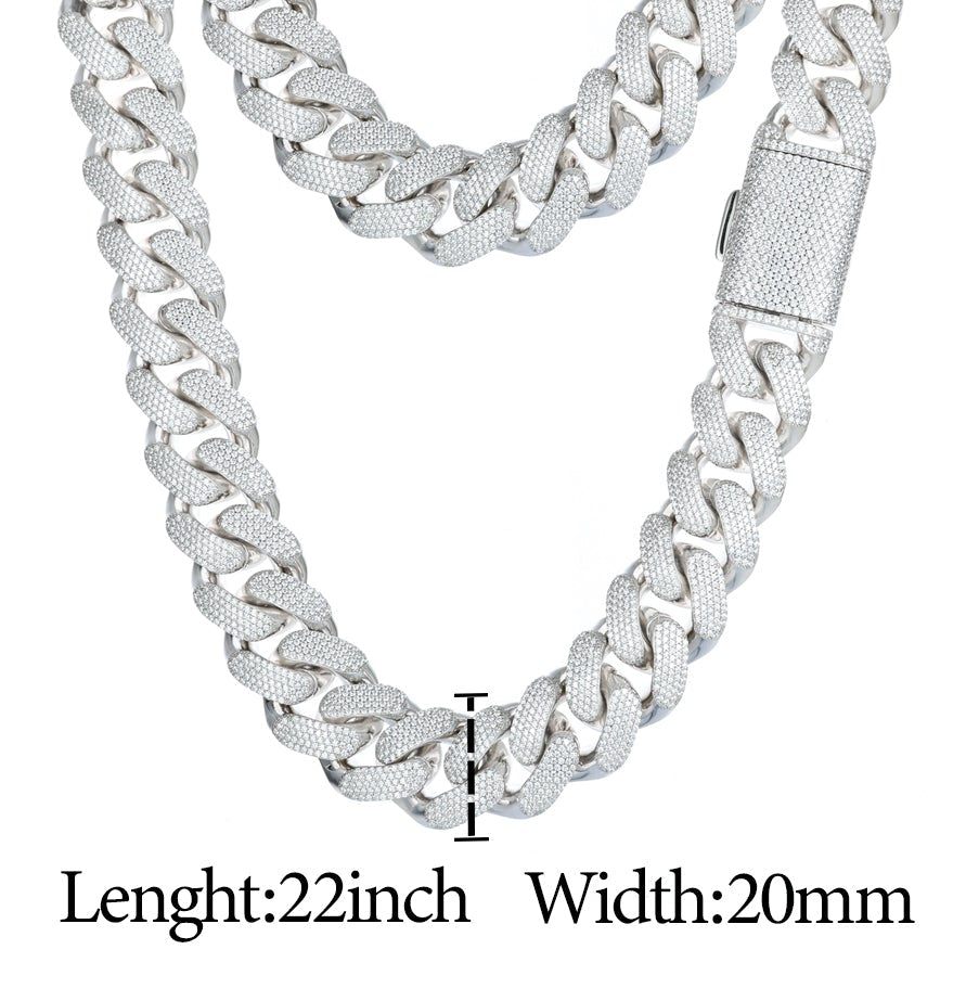 Silver chain necklace with moissanite gemstone, weight, length, and diamond color grade information displayed.