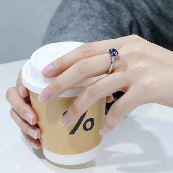 BLUE MOISSANITE PORTUGUESE CUT SOLITAIRE ENGAGEMENT RING IN SOLID GOLD