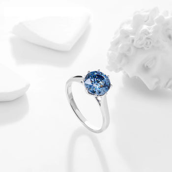 BLUE MOISSANITE PORTUGUESE CUT SOLITAIRE ENGAGEMENT RING IN SOLID GOLD