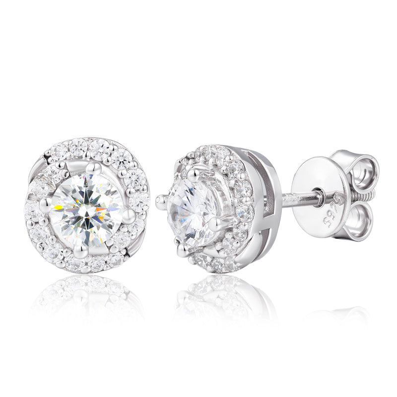 Silver stud earrings with clear gemstones on a white background