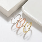 ADJUSTABLE TWIST ETERNITY BAND IN STERLING SILVER