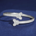 BAGUETTE MOISSANITE BUTTERFLY BANGLE BRACELET IN STERLING SILVER