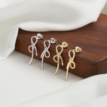 BOW TIE RIBBON STUD EARRING IN STERLING SILVER
