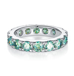 GREEN ROUND MOISSANITE ETERNITY BAND RING IN STERLING SILVER