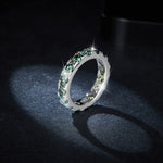 GREEN ROUND MOISSANITE ETERNITY BAND RING IN STERLING SILVER