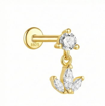 Gold earring with clear gemstones on a white background