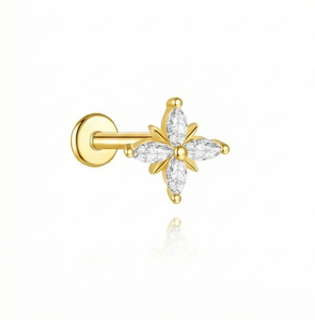 Gold earring with diamond-like stones on a white background