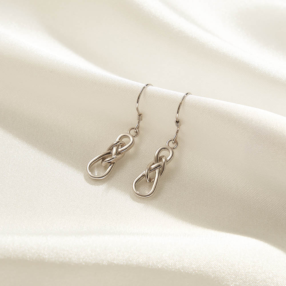 CELTIC KNOT DANGLE EARRING IN STERLING SILVER