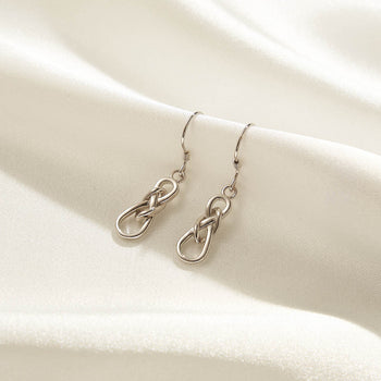 BOUCLES D'OREILLES PENDANTES À NŒUD CELTIQUE EN ARGENT MASSIF