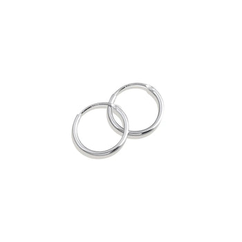 Two silver hoop earrings on a white background
