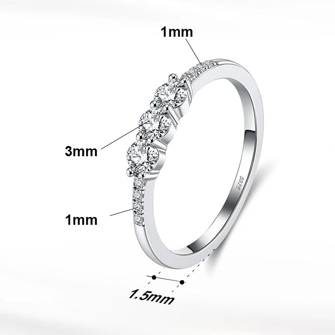 Silver ring with diamond accents and product details on a white background