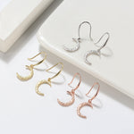 HAMMERED CRESCENT MOON EARRINGS IN STERLING SILVER