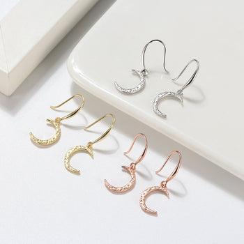 Boucles d'oreilles en forme de croissant de lune martelé en argent massif
