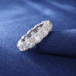 CUSHION CUT MOISSANITE DIAMOND HALO TENNIS ETERNITY RING IN STERLING SILVER