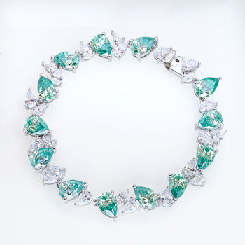 CYAN MOISSANITE PEAR CUT BRACELET IN SOLID GOLD
