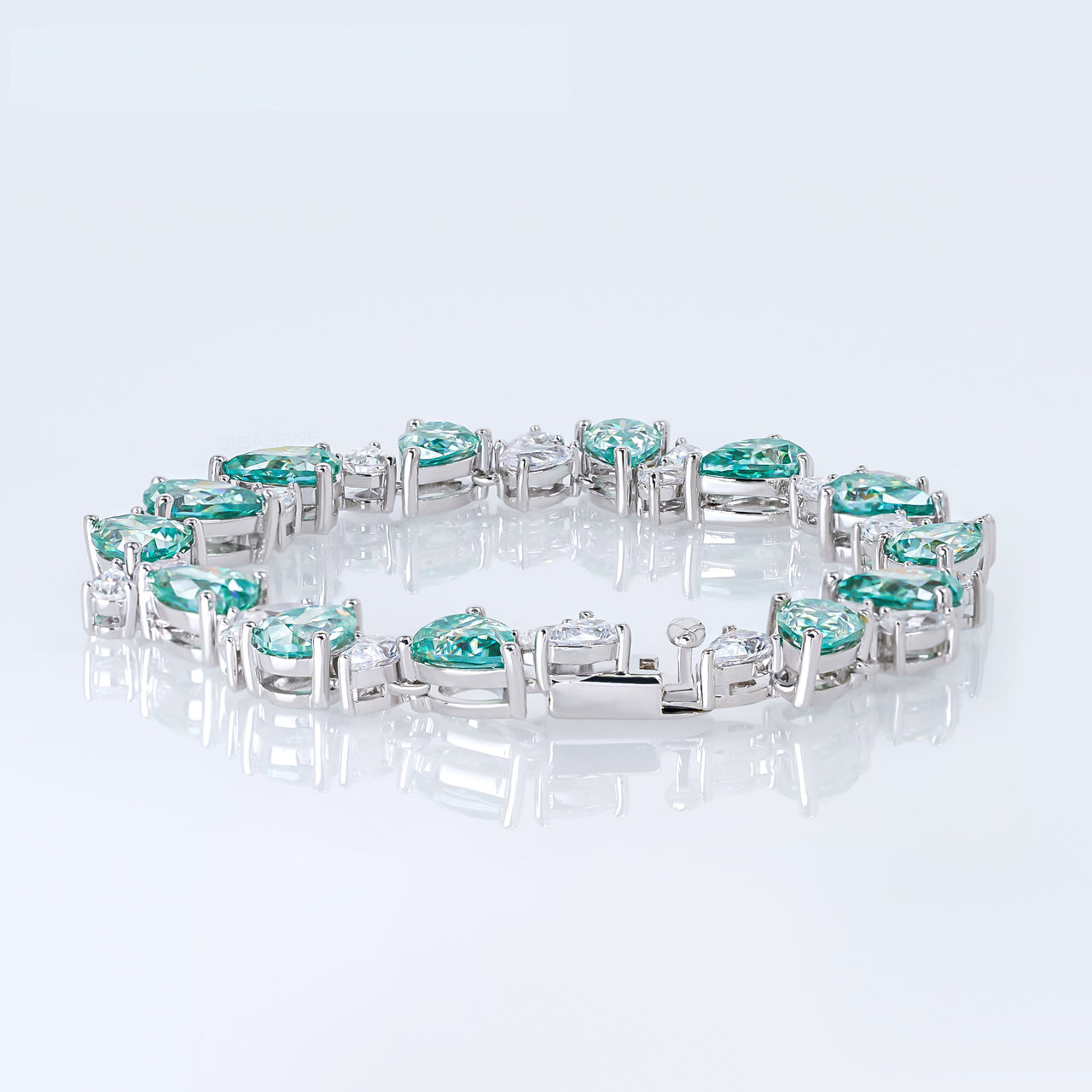 CYAN MOISSANITE PEAR CUT BRACELET IN SOLID GOLD