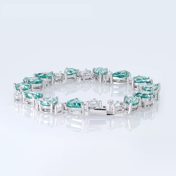 CYAN MOISSANITE PEAR CUT BRACELET IN SOLID GOLD