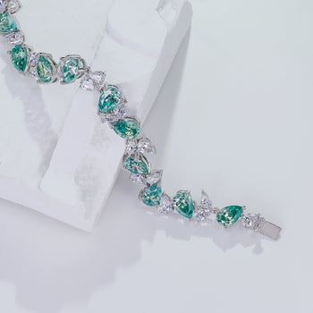 CYAN MOISSANITE PEAR CUT BRACELET IN SOLID GOLD
