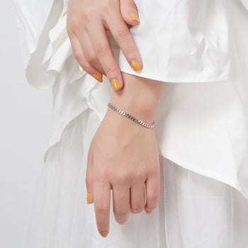 BRACELET À MAILLES CUBINES TAILLÉES EN ARGENT MASSIF