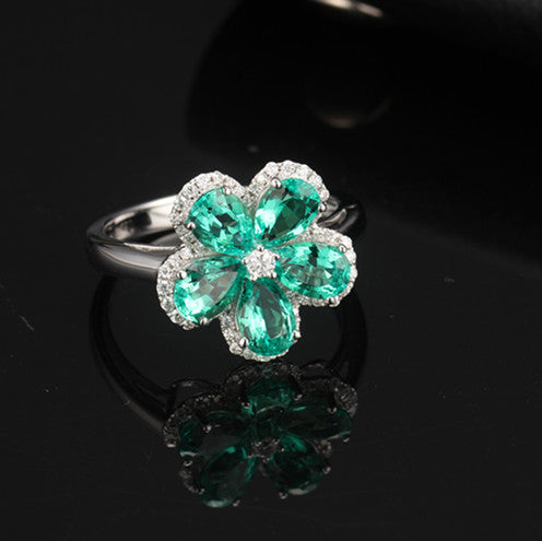 LAB GROWN EMERALD HALO FLOWER RING IN 18K WHITE GOLD
