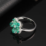 LAB GROWN EMERALD HALO FLOWER RING IN 18K WHITE GOLD