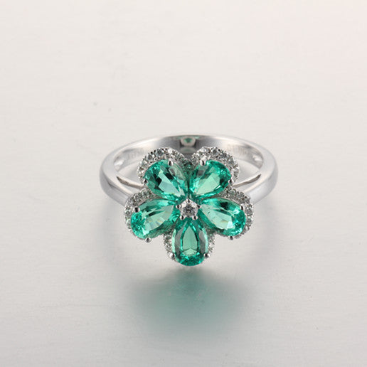 LAB GROWN EMERALD HALO FLOWER RING IN 18K WHITE GOLD