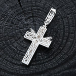 ICED OUT MOISSANITE ANGEL CROSS PENDANT IN STERLING SILVER