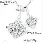 ICED OUT MOISSANITE DIAMOND IRIS PENDANT IN STERLING SILVER
