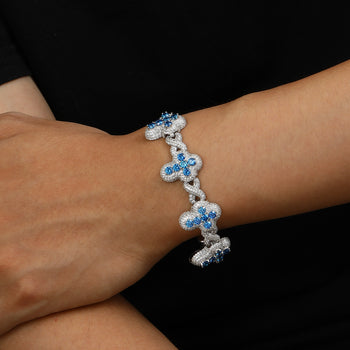 ICED OUT MOISSANITE INFINITE CROSS BRACELET IN STERLING SILVER