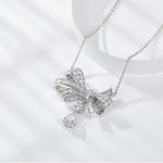IE0008 BOW KNOT MOISSANITE PENDANT NECKLACE IN STERLING SILVER