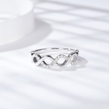 IE0041 MOISSANITE DIAMOND INFINITY RING IN STERLING SILVER