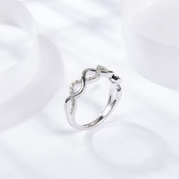 IE0041 MOISSANITE DIAMOND INFINITY RING IN STERLING SILVER