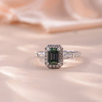 IE0083 1CT GREEN MOISSANITE EMERALD CUT RING IN STERLING SILVER