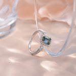 IE0083 1CT GREEN MOISSANITE EMERALD CUT RING IN STERLING SILVER