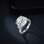 IE0110 ROUND BRILLIANT CUT MOISSANITE ENGAGEMENT RING IN STERLING SILVER