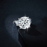 IE0110 ROUND BRILLIANT CUT MOISSANITE ENGAGEMENT RING IN STERLING SILVER