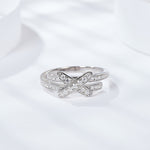 IE3004 KNOT MOISSANITE ENGANGEMENT RING IN STERLING SILVER