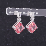 ASSCHER CUT LAB GROWN PADPARADSCHA SAPPHIRE DANGLE DROP EARRINGS IN 18K WHITE GOLD