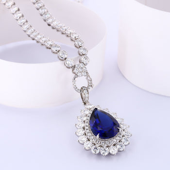 LAB GROWN ROYAL BLUE SAPPHIRE AND MOISSANITE PENDANT TENNIS CHAIN NECKLACE IN 9K SOLID GOLD