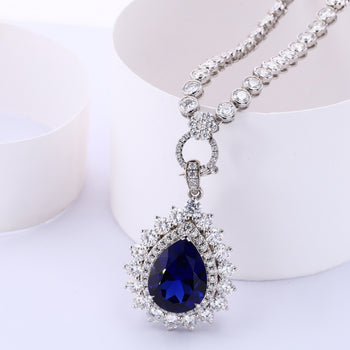 LAB GROWN ROYAL BLUE SAPPHIRE AND MOISSANITE PENDANT TENNIS CHAIN NECKLACE IN 9K SOLID GOLD