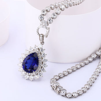LAB GROWN ROYAL BLUE SAPPHIRE AND MOISSANITE PENDANT TENNIS CHAIN NECKLACE IN 9K SOLID GOLD